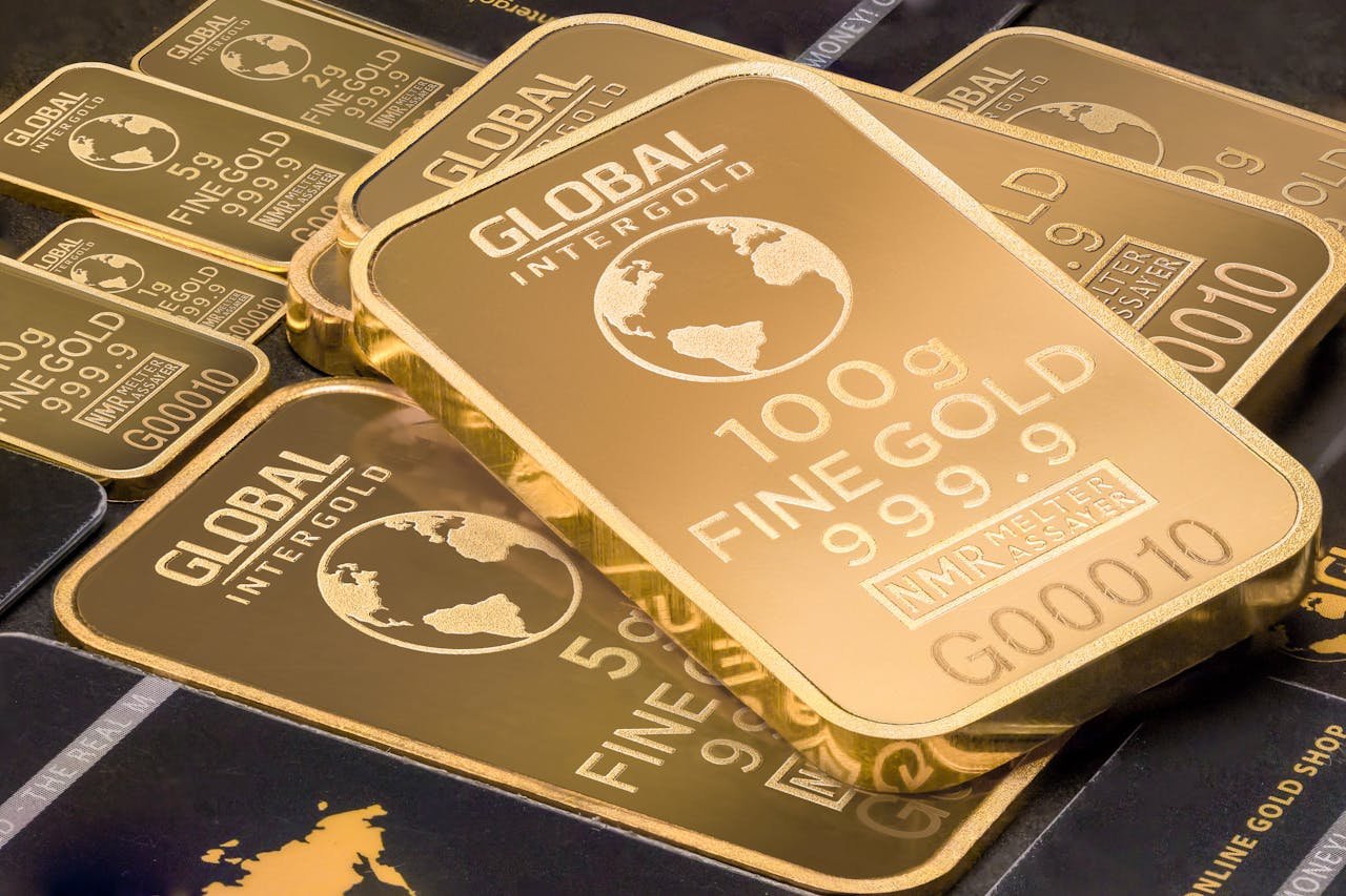 A detailed shot of gold bars labeled Global Intergold as a symbol of wealth and investment.